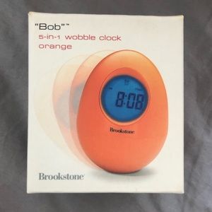 NEW Orange Brookstone Bob 5 in 1 Wobble Clock